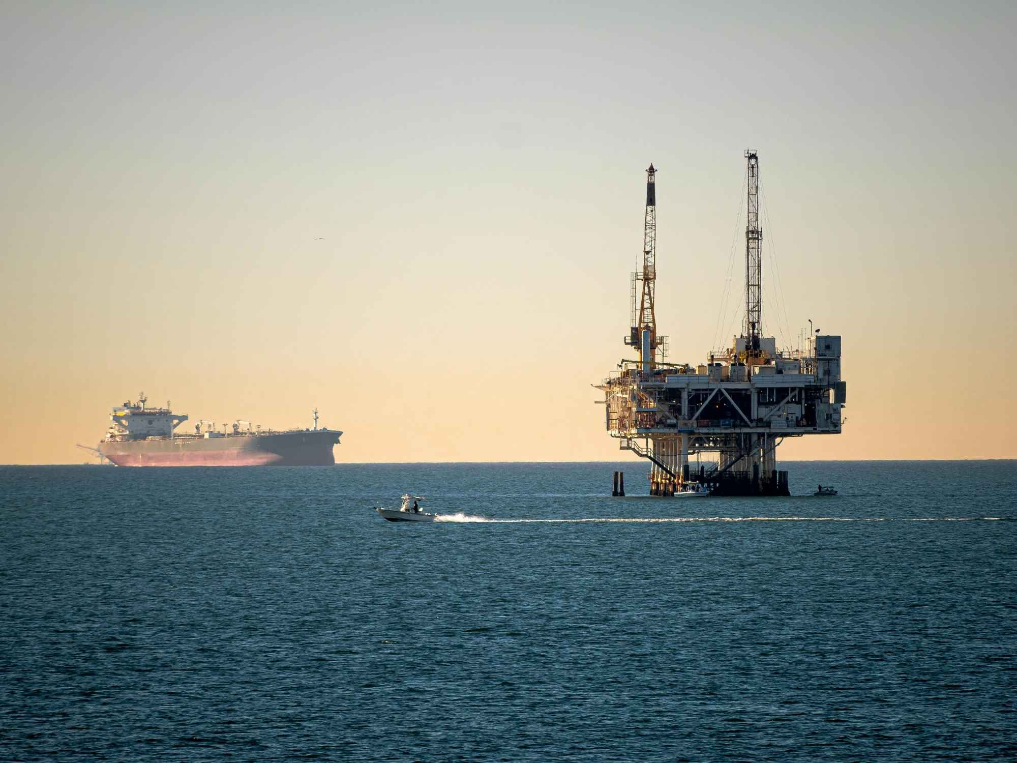 Offshore Oil Rig and Container Ship at Sea
